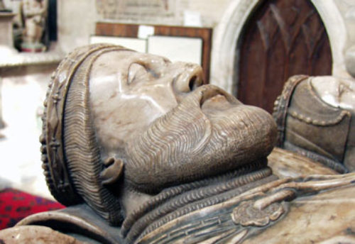 Fig 2 – Detail view of the Earls effigy showing his coronet and the mantle of the Order of the Garter